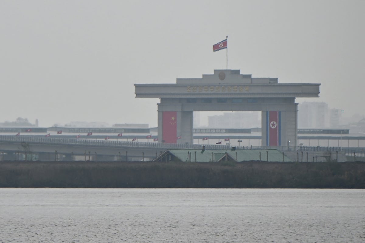 China and North Korea deepen ties as big new bridge opens