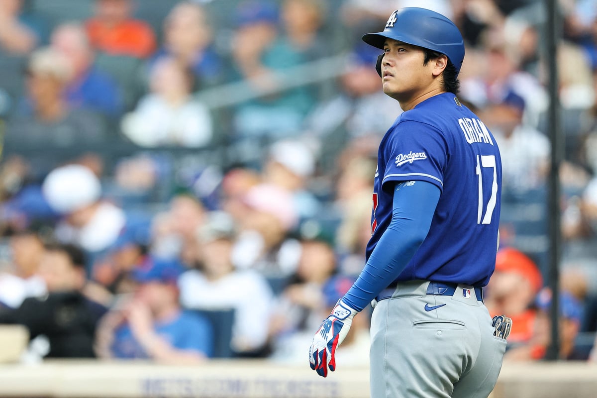 Shohei Ohtani delays throwing session over knee "regression"