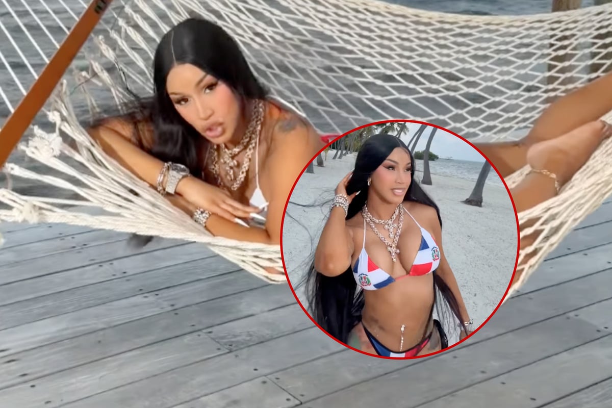 Cardi B previews new music with sultry beach video – and claps back at fans!