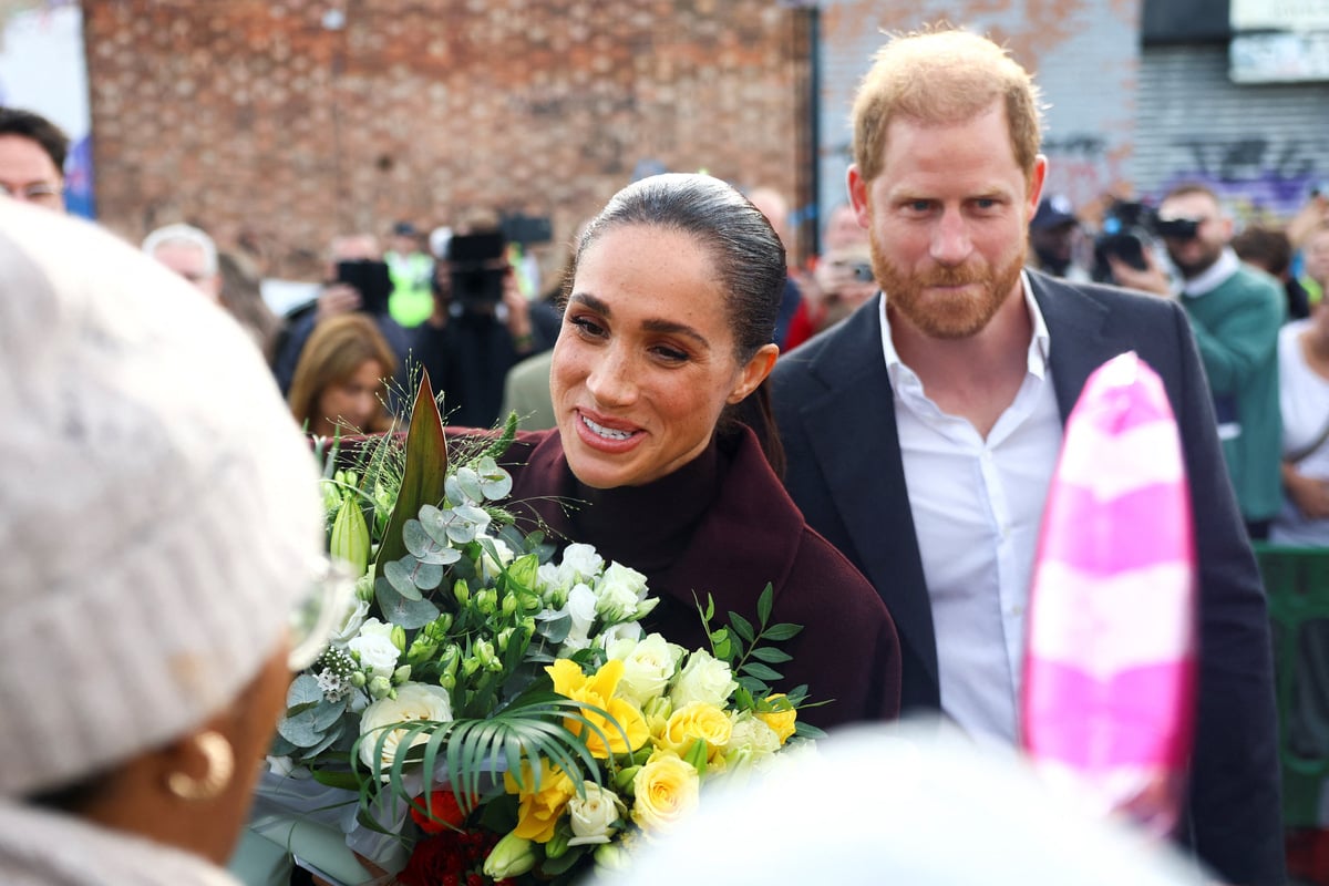 Prince Harry, Meghan greeted with cheers in first joint public appearance since UK return