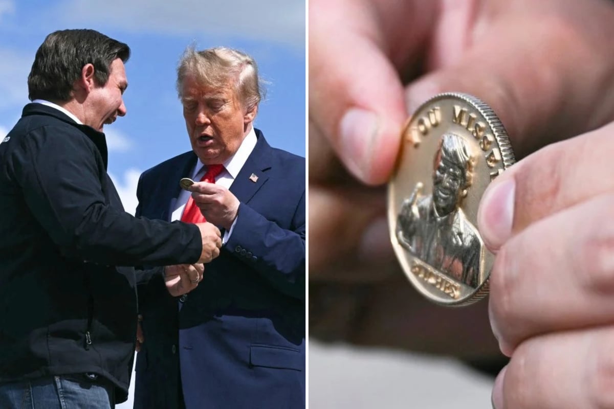 Ron DeSantis gifts Trump engraved gold coin in cringy display of MAGA loyalty: "You missed b*****s!"