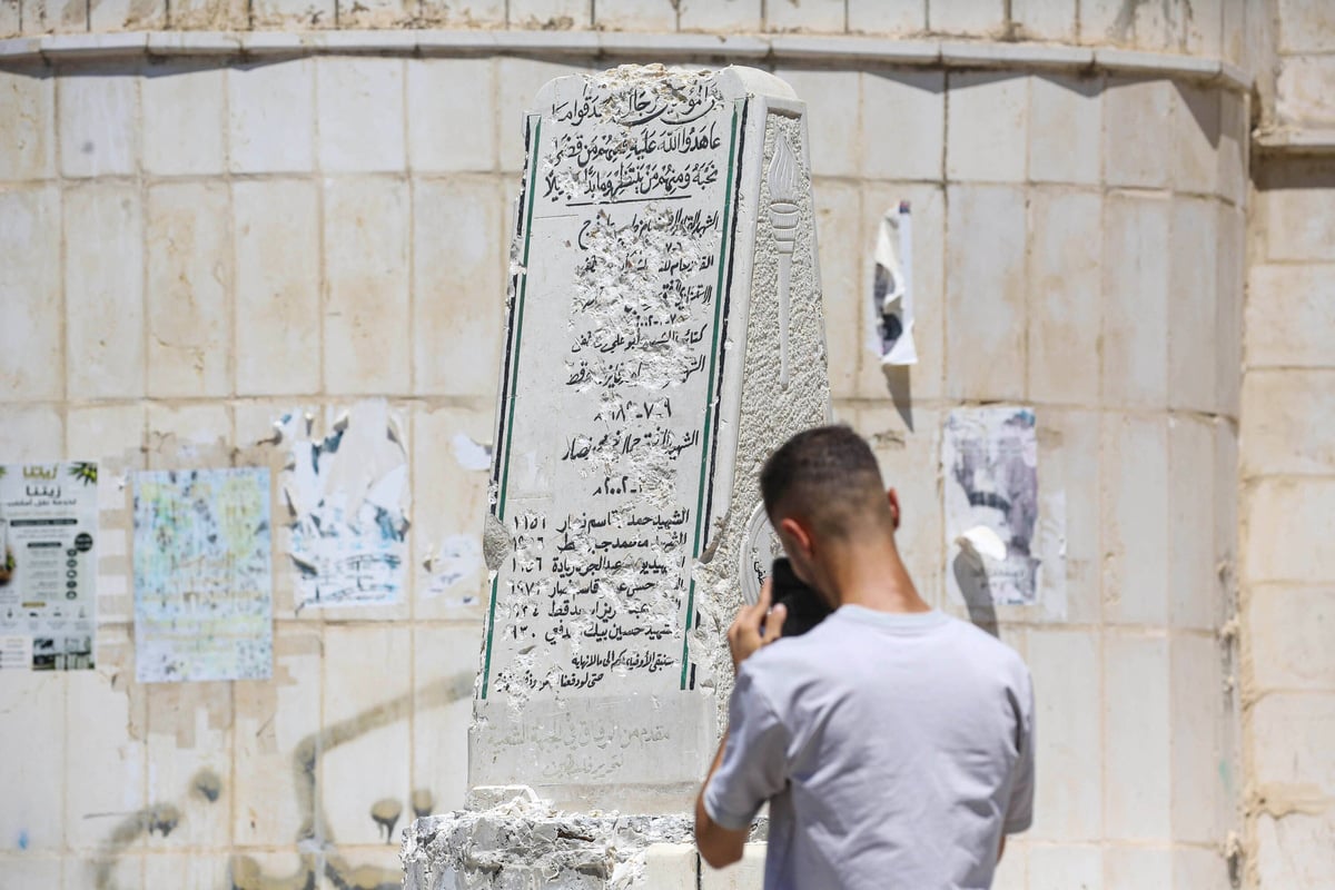 Israeli lawmaker under army escort smashes Palestinian memorial in West Bank