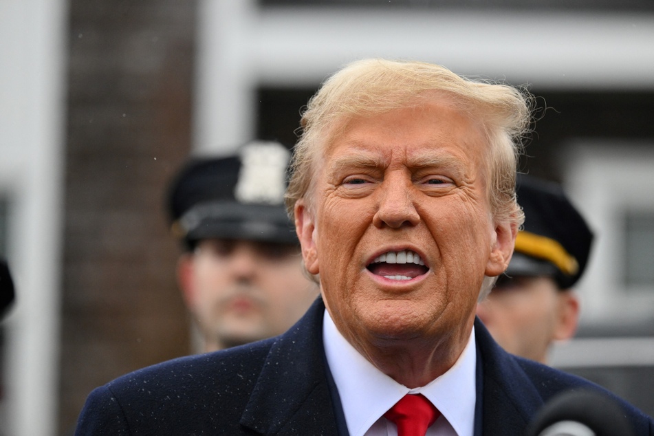Donald Trump called for "law and order" at the wake of a NYPD officer who was shot and killed on Monday.