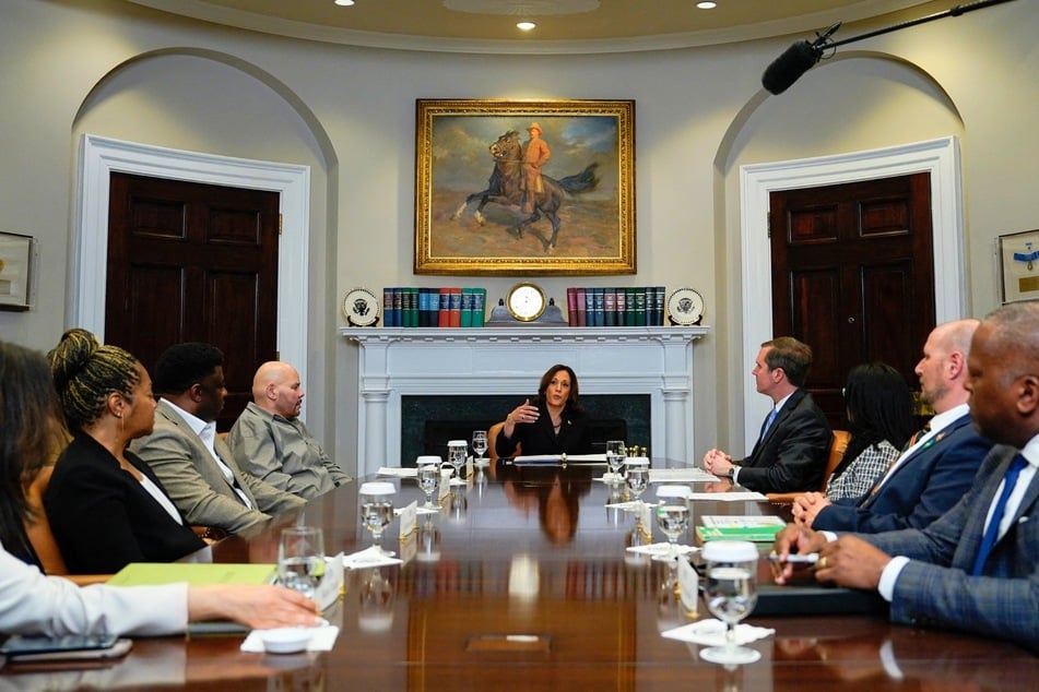 On Friday, Vice President Kamala Harris (c.) hosted a discussion at the White House regarding the possible rescheduling and legalization of marijuana.