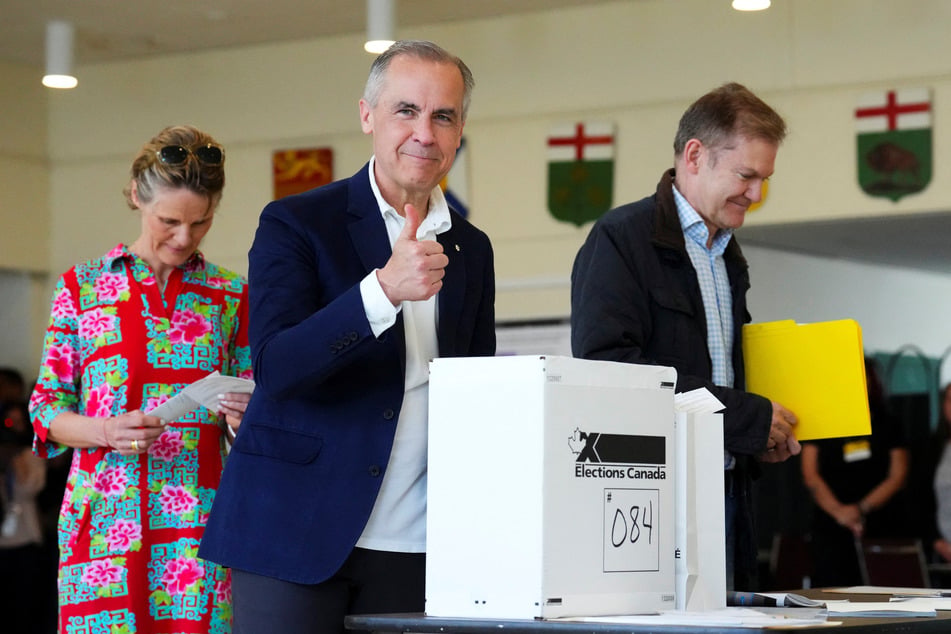Canada's Liberal Leader Mark Carney casts his vote in Ottawa, Ontario, on April 28, 2025.