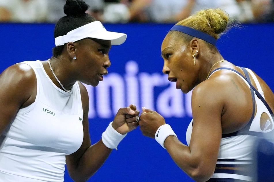 Serena Williams (r.) and Venus Williams (l.) react during their US Open first round match against Australia's Maya Joint and Taiwan's Chan Hao-ching on September 4, 2026.