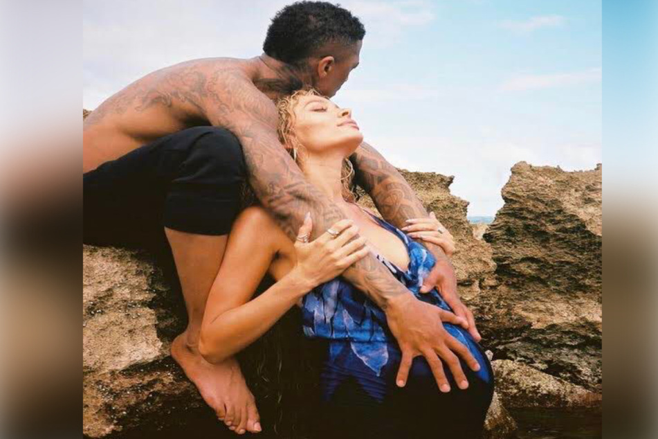 Nick Cannon (l) pictured with Alyssa Scott (r) in what appeared to be a maternity photo. The model shared the picture on Father's Day.