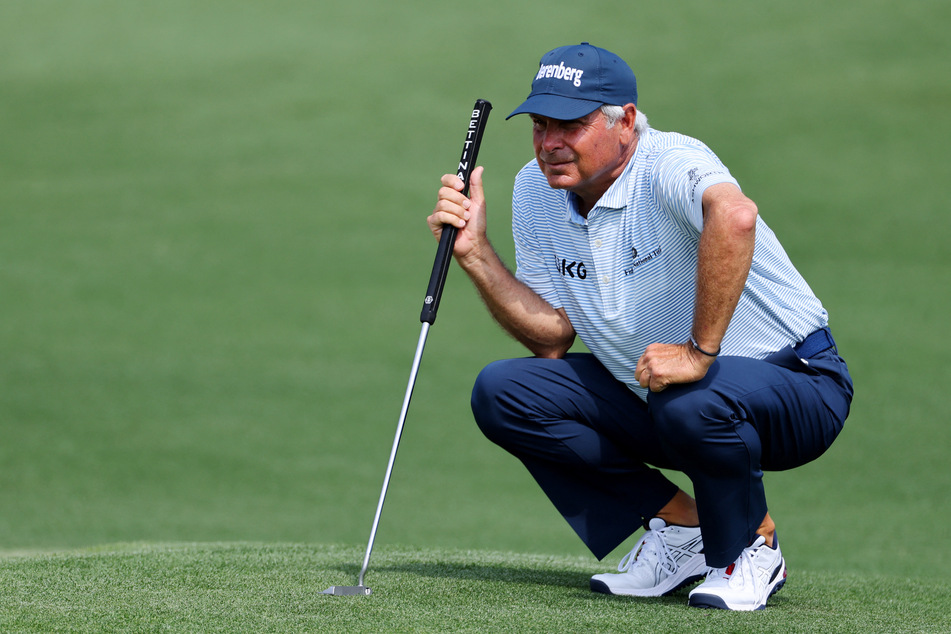 Fred Couples of the US lines up a putt during the 2023 Masters in Augusta, Georgia.