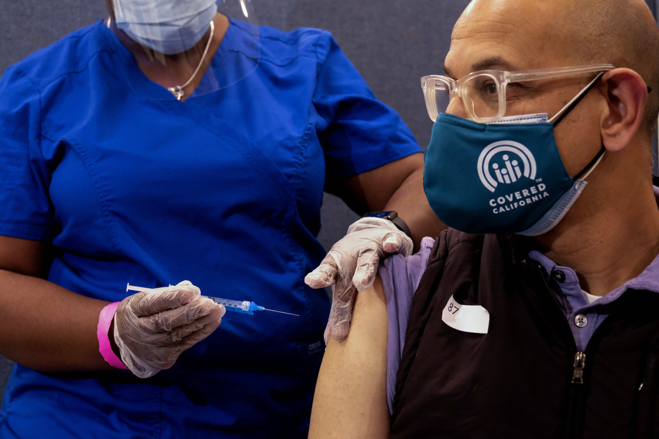 California Health and Human Services Secretary Dr. Mark Ghaly receiving his Covid-19 vaccine.