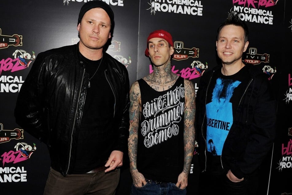 Blink-182 members Tom DeLonge (47), Travis Barker (47), and Mark Hoppus (50) have delayed the start of their world tour.