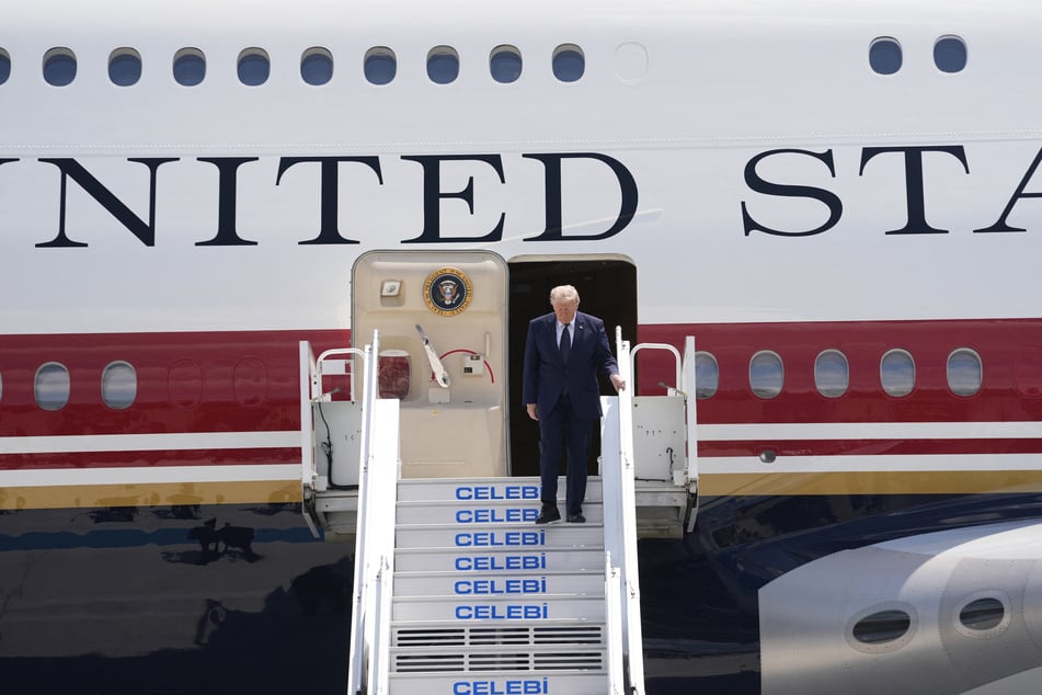 President Donald Trump disembarks from Air Force One upon his arrival at Etimesgut Air Base near Ankara, Turkey, on July 7, 2026.