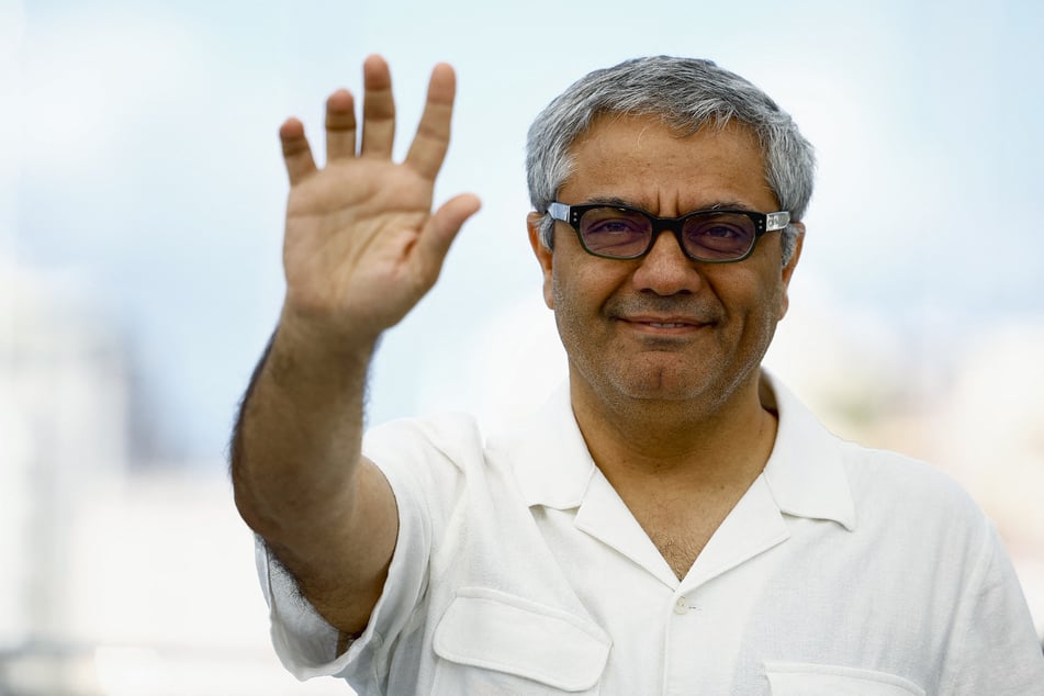 Iranian director Mohammad Rasoulof poses during a photocall for The Seed of the Sacred Fig in competition at the 77th Cannes Film Festival.