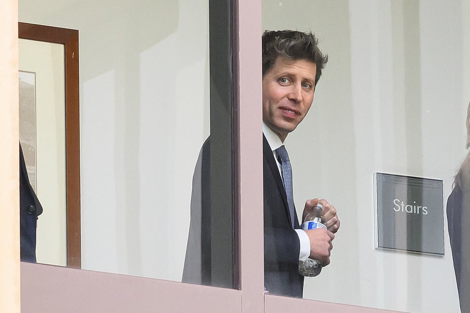 Sam Altman walks inside the federal courthouse during a recess in the proceedings in the trial over Elon Musk's lawsuit against OpenAI in Oakland, California, on May 12, 2026.