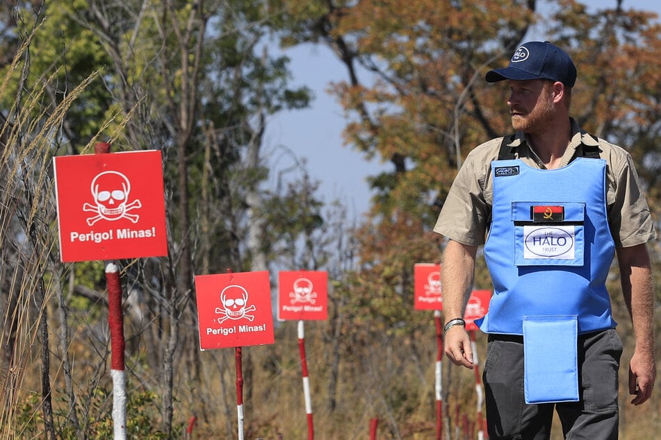 Prince Harry visited Angola on Wednesday to back landmine clearance efforts, retracing the steps of his late mother, the charity leading the project said.