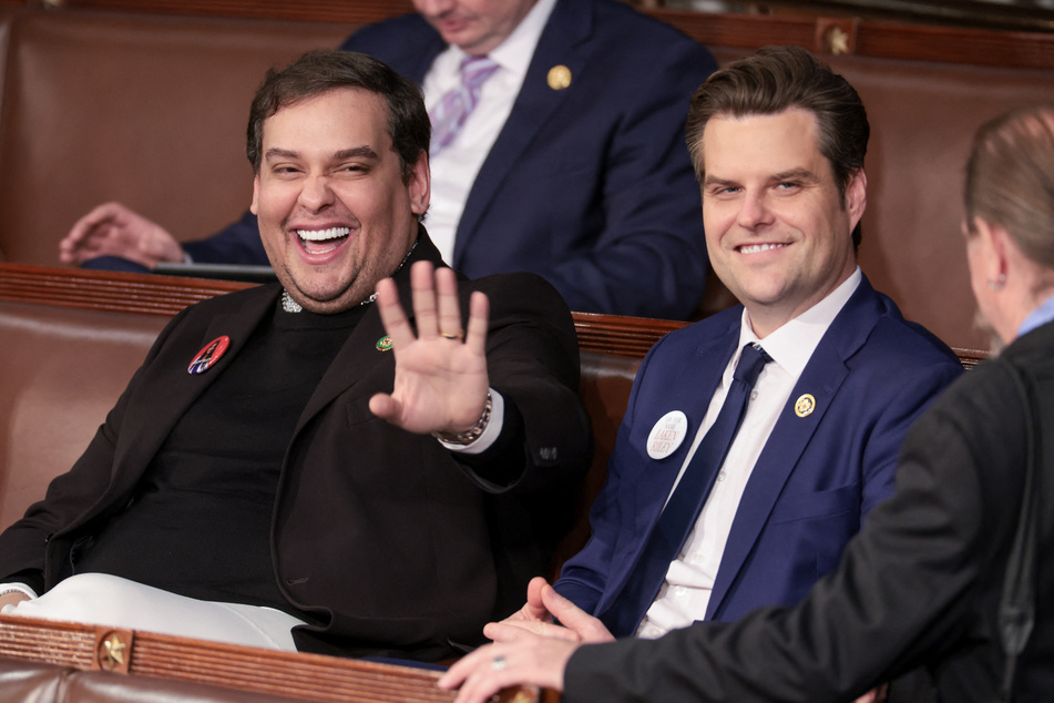 Former Representative George Santos (l.) sitting with Rep. Matt Gaetz (r.) at US President Joe Biden's State of the Union address in Washington DC on March 07, 2024.