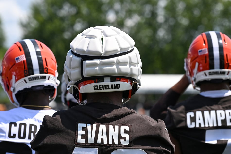 Some NFL players have elected to wear guardian caps, which help absorb the impact of dangerous blows to the head. 