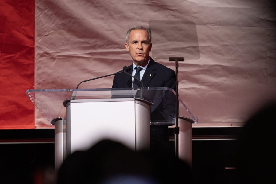 Prime Minister Mark Carney speaks at a rally hosted by Forever Canadian on Canadian Unity at the Edmonton Expo Center in Alberta, Canada, on October 16. Carney is looking to ramp up Canada's defense spending amid threats from the US.