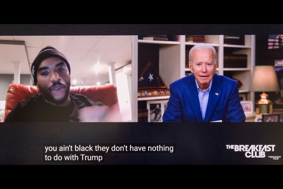 Joe Biden (r.) appeared on the radio show The Breakfast Club, during which he infamously implied to host Charlamagne tha God that Black people who don't vote for him "ain't Black."