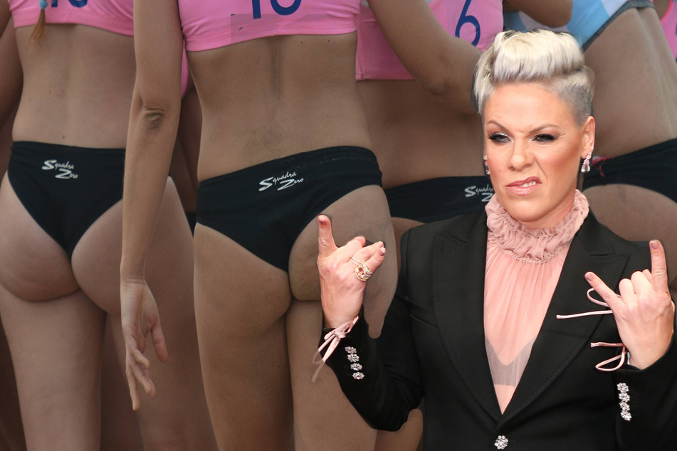 Pink wants to pay the Norwegian women's beach handball team's fine for "inappropriate clothing."