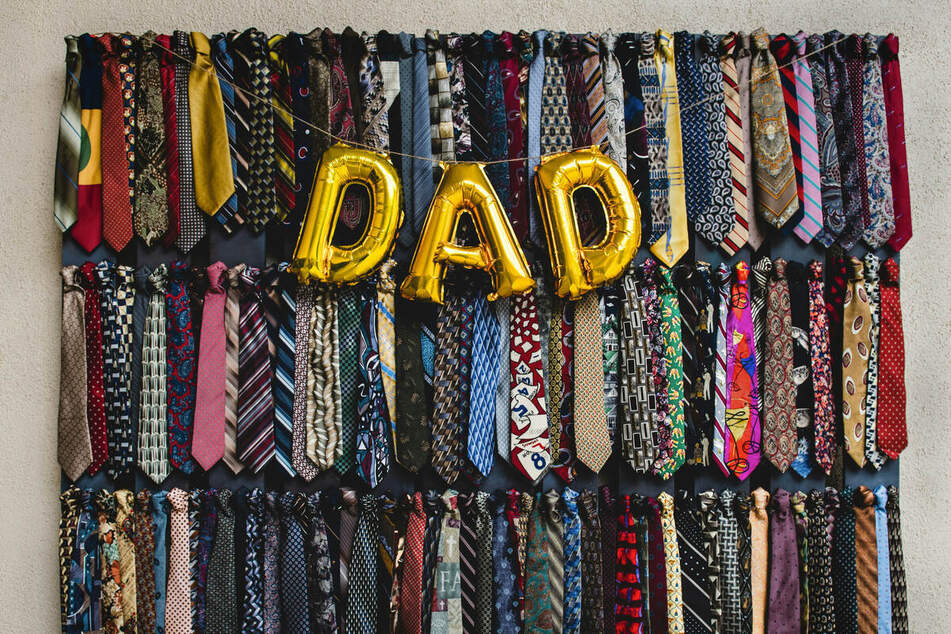 A tie might seem like a good choice - but what color works best, and what will he actually wear?