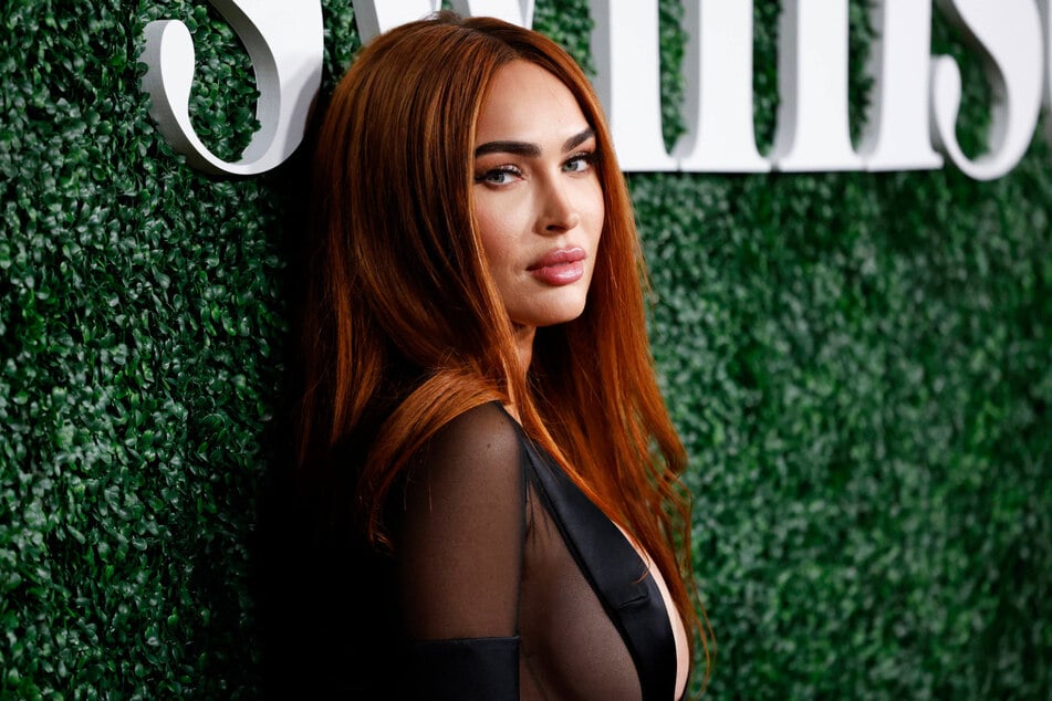 Megan Fox attends a red carpet. The actor is now the co-owner of Subs.com.