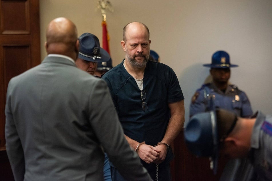 Former Rankin County Sheriff's deputy Brett McAlpin walks into the courtroom as the "Goon Squad" sentencing session begins at the Rankin County Circuit Court in Brandon, Mississippi.