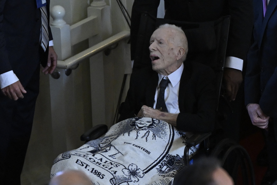 Former US President Jimmy Carter arrives for a tribute service for former First Lady Rosalynn Carter in Atlanta, Georgia, on Tuesday.