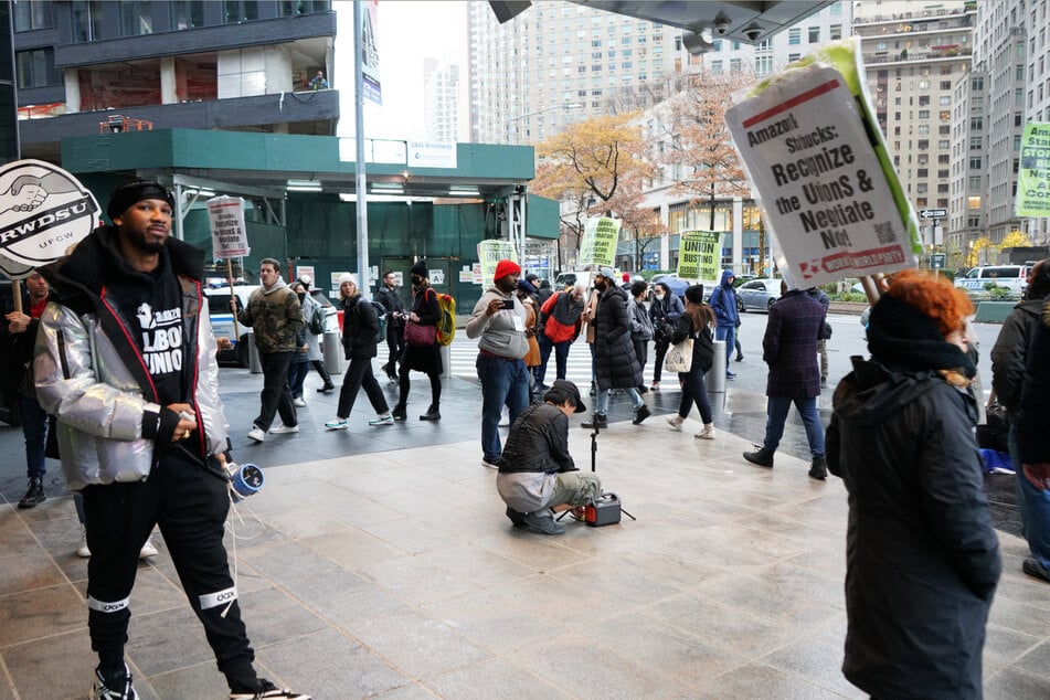 The group held a picket line, shouting chants like "What do we want? Contracts! When do we want 'em? Now!"