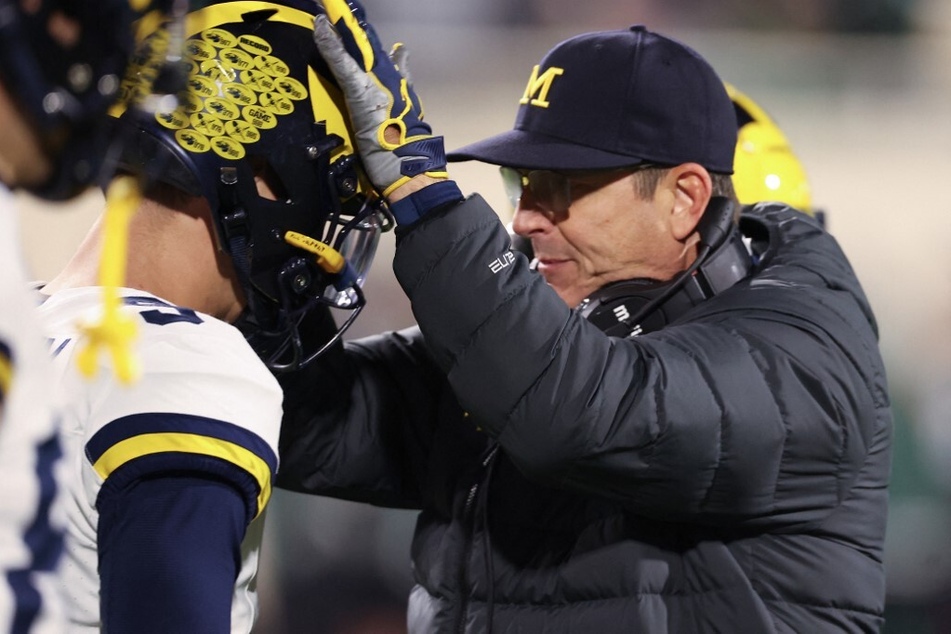 Jim Harbaugh avoided addressing media questions about the rumors of him coaching the LA Chargers, hinting at potential interest.