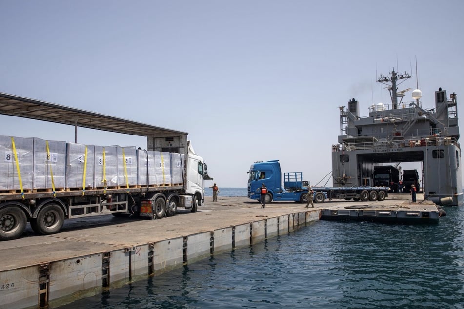 The UN World Food Programme has suspended the delivery of aid to Gaza via a temporary US military pier in order to assess the security situation, a spokesperson said Monday.