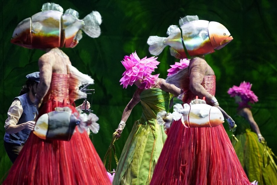 Dancers take part in a dress rehearsal of Florencia en el Amazonas, sung in Spanish, at the Met Opera in New York on November 13, 2023.