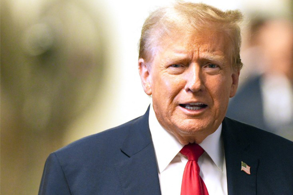 Trump evades charges in Michigan "fake elector" plot as other conspirators revealed