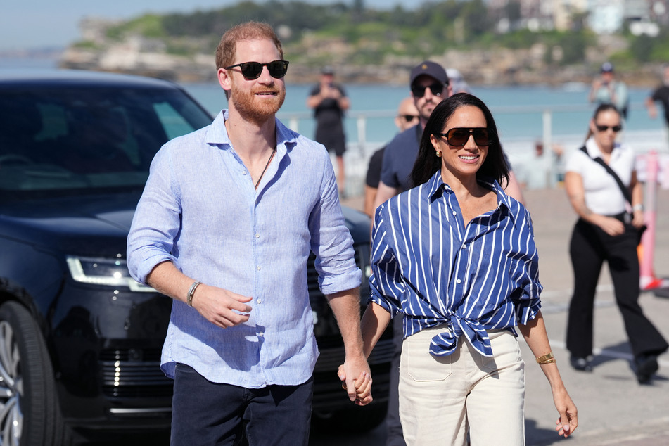 Prince Harry (l.) and Meghan Markle traveled to Australia for four days in mid-April.
