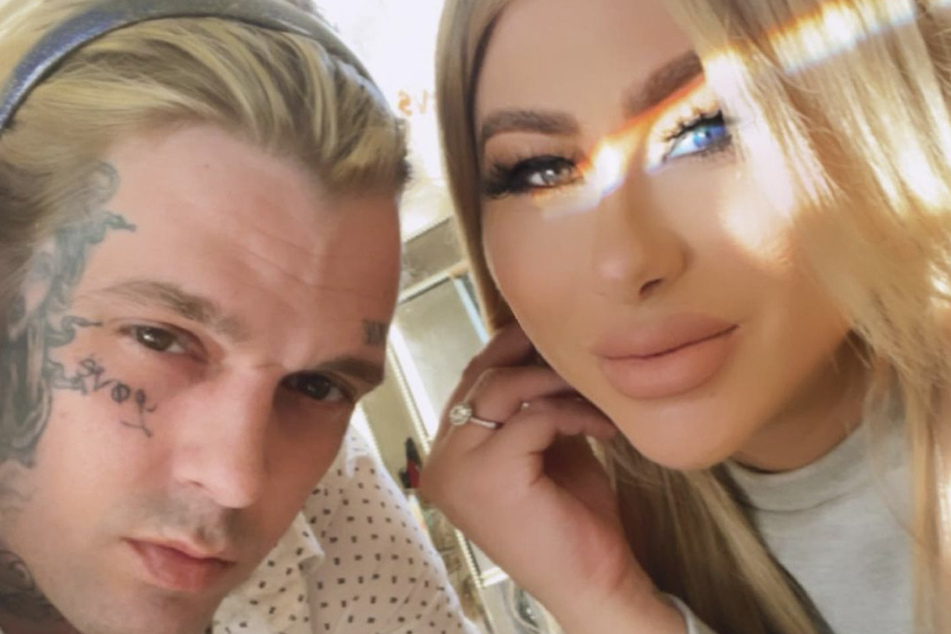 Over the weekend, Melanie Martin (r) apologized to Aaron Carter (l) after the singer accused her of lying to him.