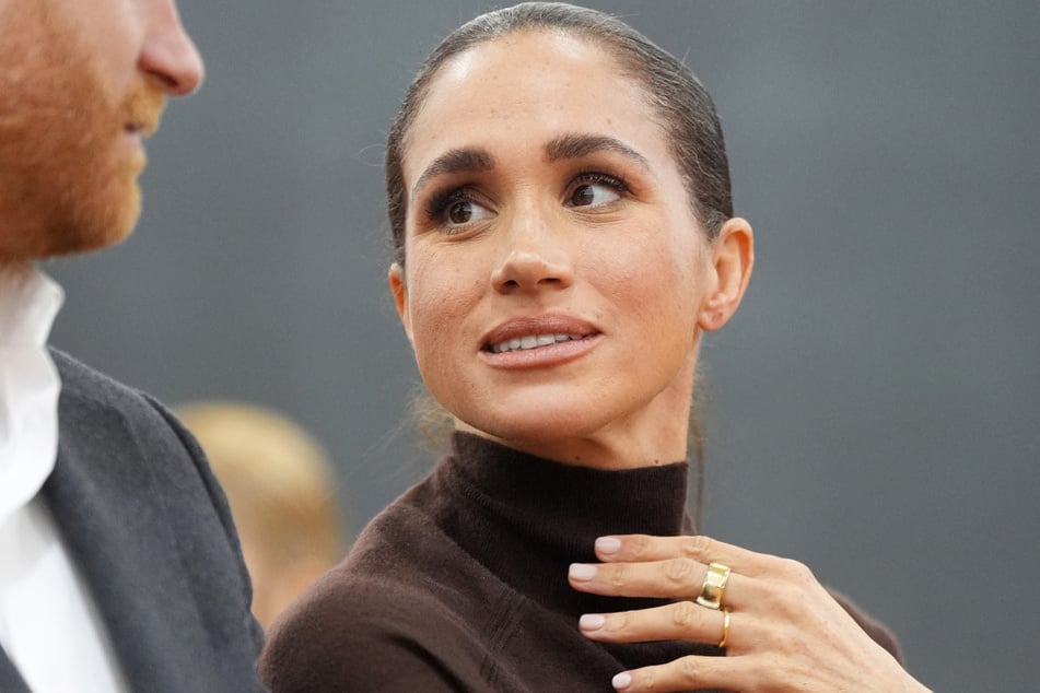 Meghan, Duchess of Sussex, visits the Community Recording Studio in Nottingham, central England, on October 15. On Friday, Meghan reacted to the news of her father's alleged possession of child abuse images.
