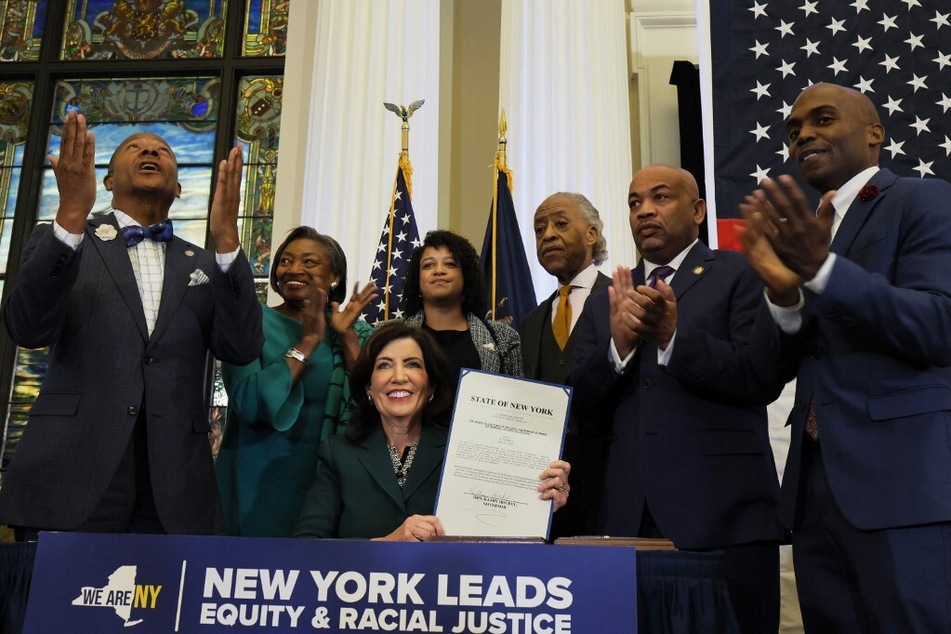Governor Kathy Hochul signs legislation to establish the New York State Community Commission on Reparations Remedies in December 2023.