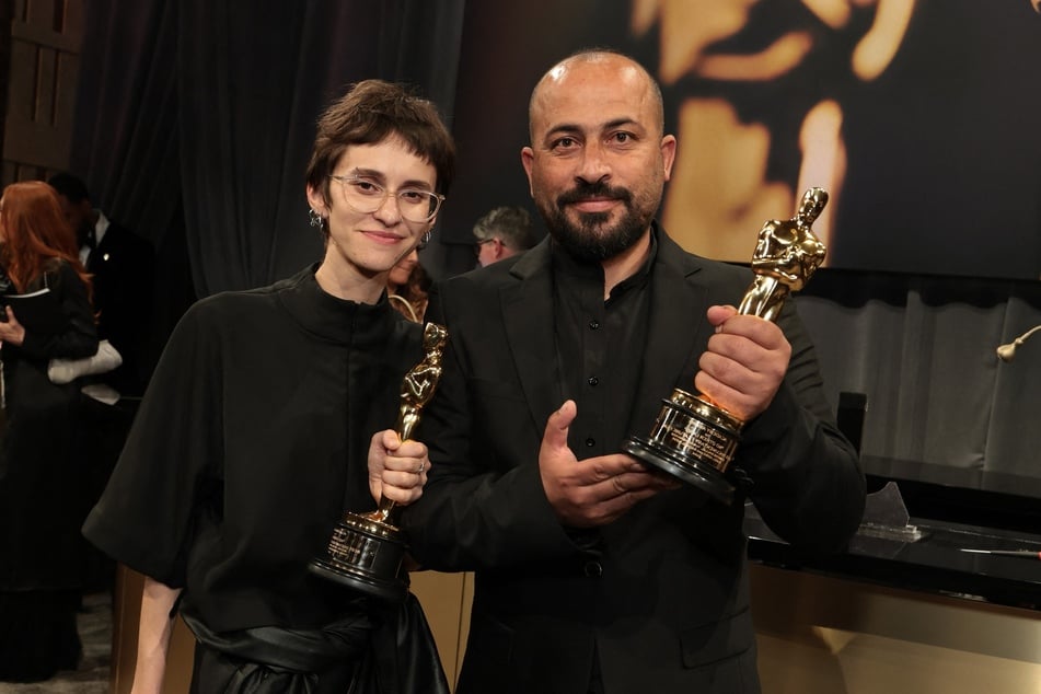 Hamdan Ballal (r.) and Rachel Szor (l.), winners of the Best Documentary Feature Film for No Other Land, attend the 97th Annual Oscars Governors Ball at Ovation Hollywood Complex on March 2, 2025 in Hollywood, California.