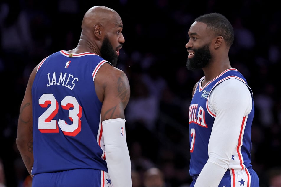 Philadelphia 76ers forward LeBron James (l.) talks to guard Jaylen Brown (r.) during the fourth quarter against the New York Knicks at Madison Square Garden.