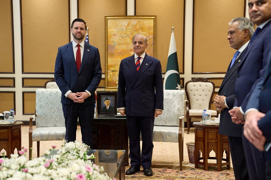 US Vice President JD Vance (l.) is welcomed by Pakistani Prime Minister Shehbaz Sharif ahead of their meeting on Iran in Islamabad on April 11, 2026.