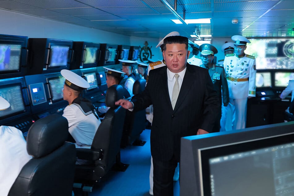 Kim Jong Un tours the destroyer "Kang Kon" during a commissioning ceremony. US President Donald Trump recently shared that he plans to meet with the North Korean leader later this year.