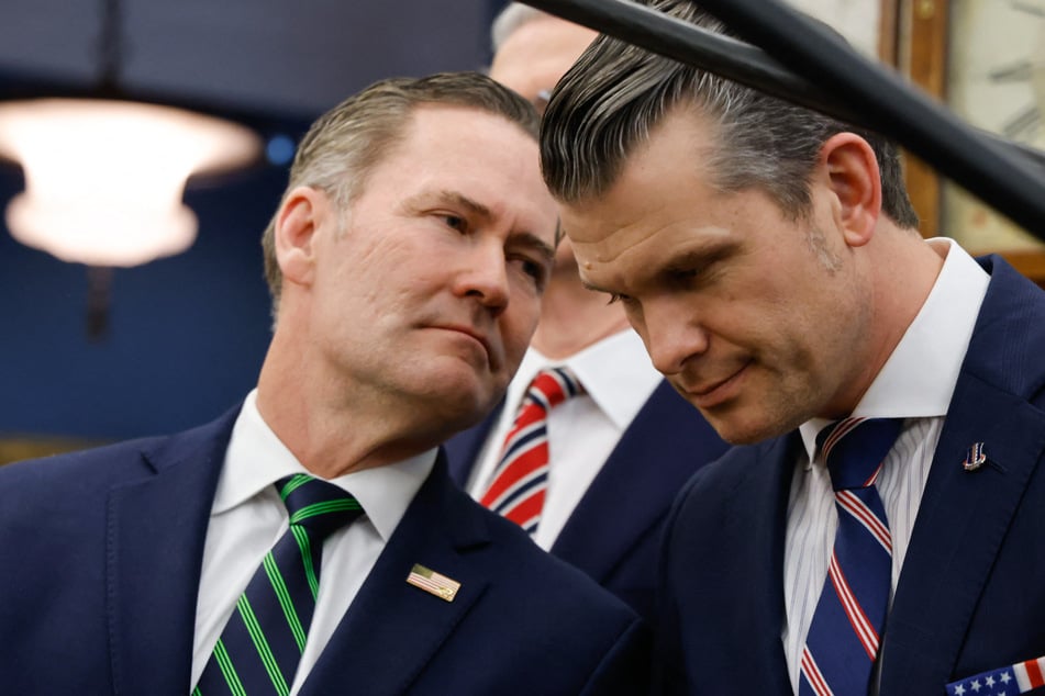 Mike Waltz (l.) and Defense Secretary Pete Hegseth have faced calls to resign over their roles in the "Signalgate" scandal.