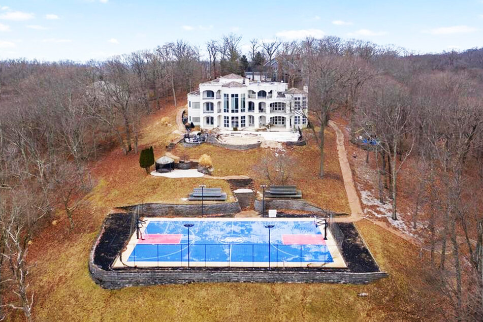 The house also has an old basketball court.