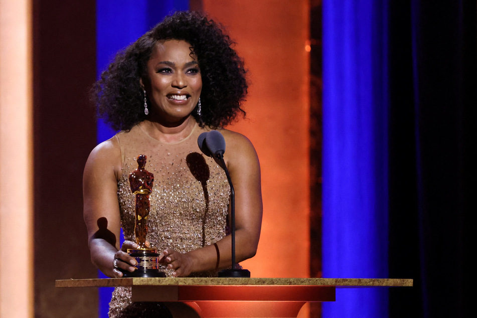 Angela Bassett accepts her honorary Oscar during the 14th Governors Awards in Los Angeles, California, on January 9, 2024.