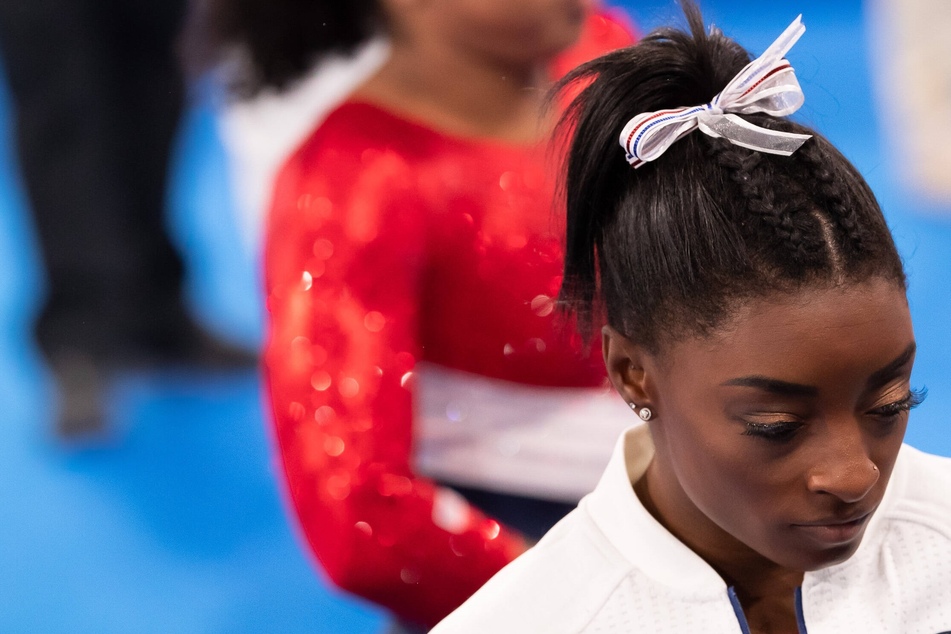 Simone Biles withdraws from floor exercise as last Olympic event hangs in the balance