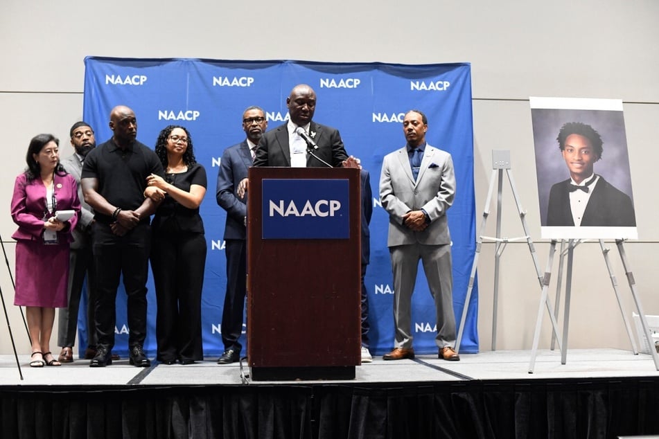 Attorney Ben Crump appears with the parents of Nolan Wells at the 117th NAACP National Convention in Chicago, Illinois, on July 22, 2026.