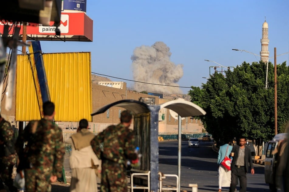 Smoke rises during a reported airstrike by the Saudi-led coalition on the Houthi-controlled Yemeni capital Sanaa on October 9, 2026.A reported Houthi attack at Riyadh's international airport on Saturday, October 11, has left dozens wounded. 