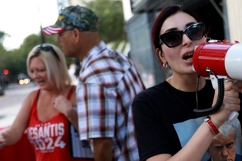 Far-right conspiracy theorist Laura Loomer helped push an online campaign to convince the army to rescind its offer.