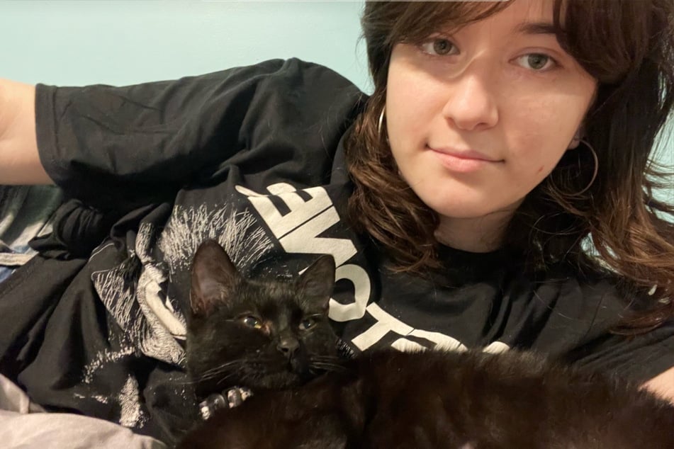 The 21-year-old student nursed the black four-legged friend back to health.