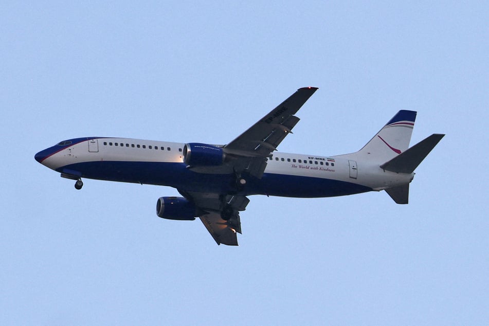 An Iranian commercial aircraft lands at Mehrabad Airport in Tehran on September 25, 2026. The Iraqi government is seeking a waiver of certain sanctions on Iranian airlines, claiming on Saturday it is in talks with the US government.
