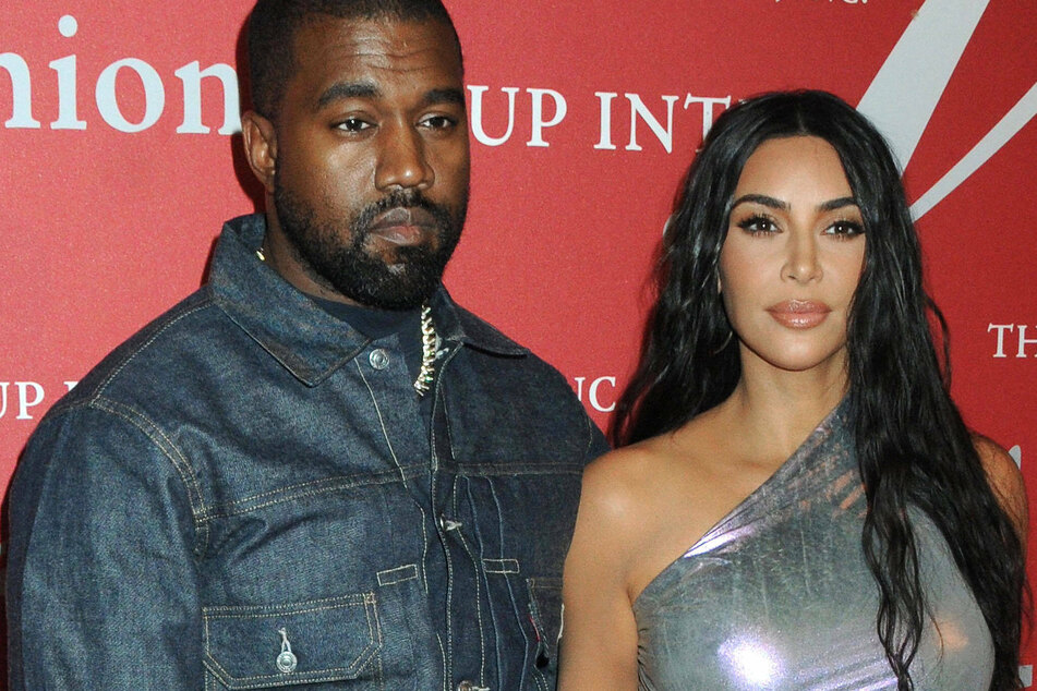 During Tuesday's event, Ye alluded to his divorce from Kim Kardashian (r.) and played a snippet from her opening monologue on Saturday Night Live.